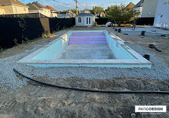 Inground pool Installation by Patio Design inc.