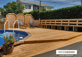 Patio with overground pool by Patio Design inc.