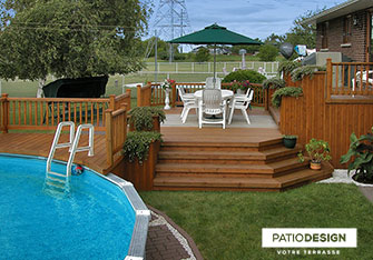 Patio with overground pool by Patio Design inc.