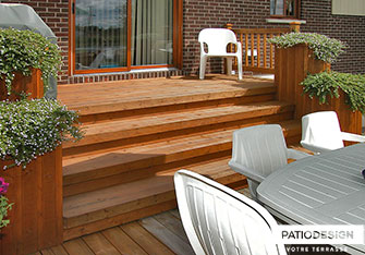 Patio with overground pool by Patio Design inc.