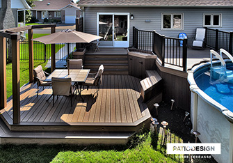 Patio with overground pool by Patio Design inc.