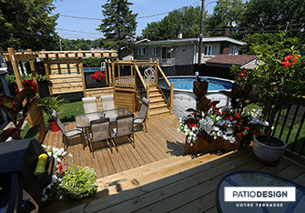 Patio with overground pool by Patio Design inc.
