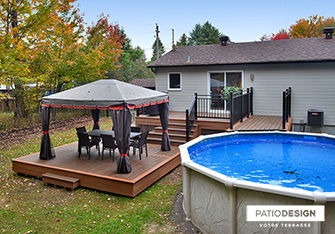 Patio avec piscine hors-terre par Patio Design inc.