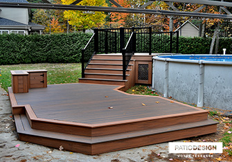 Patio with overground pool by Patio Design inc.