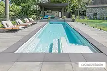 Installation of fiberglass inground pool byr Patio Design inc.